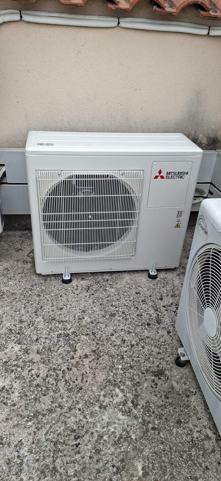 Mitsubishi Electric air conditioning outdoor units on a terrace, installed by JAG Alcaide