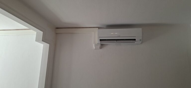 Mitsubishi Electric wall-mounted split in a room, installed by JAG Alcaide