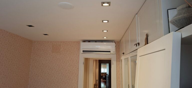 Mitsubishi Electric wall-mounted split above a hallway door, installed by JAG Alcaide